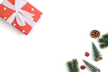 Obraz premium Christmas holiday composition with red gift box and decoration isolated on white background, new year and xmas or anniversary with presents in season, top view or flat lay.