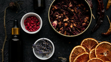 spices and herbs on dark background