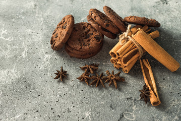  tasty healthy cookies and cinnamon and anise on the table