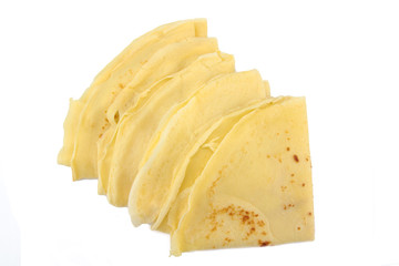 several french pancakes on a white background