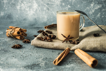 cup of masala tea with cinnamon and star anise