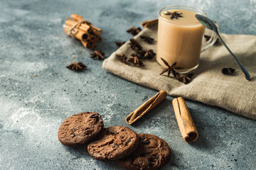 cup of masala tea with cinnamon and star anise
