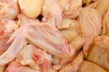raw chicken wings close-up prepared for frying