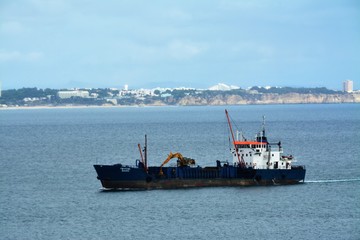 Fototapeta premium a ship on the ocean in Lagos - Portugal 31.Oct.2019