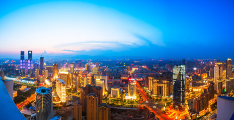 Obraz premium modern high-rise buildings line the new honggutan district in nanchang, jiangxi province. China's important manufacturing center and birthplace of the aviation industry