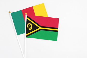 Vanuatu and Cameroon stick flags on white background. High quality fabric, miniature national flag....