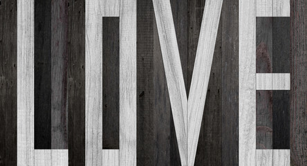 The word love is made of wooden planks.  Wood texture for background.