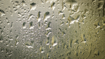 Water drops on glass for background and design