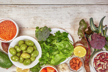 Fototapeta na wymiar Diet vegetables fruits on wooden background.