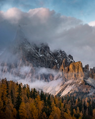 Dolomite mountains in South Tyrol, Italy during sunset in Autumn season / High ISO image