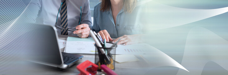 Two business people working together; panoramic bann