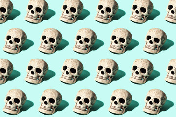 skull with a hard shadow on mint background