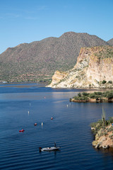 Kayaks in the Lake with Hills and Mountains 
