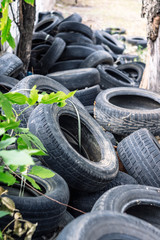 A bunch of old tires from used cars.