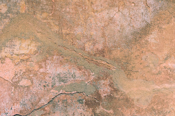 Cracked and peeling paint old wall background.