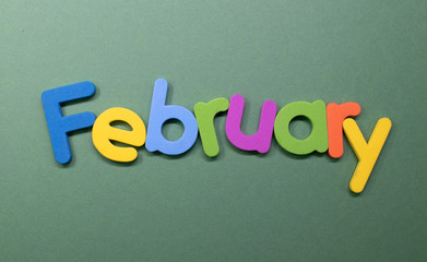 Word "February" written with color sponge