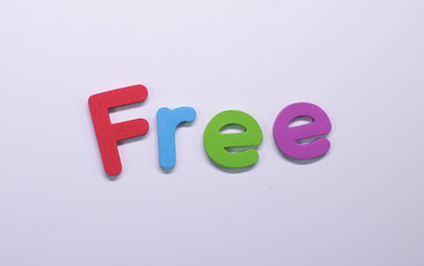 Word "Free" written with color sponge