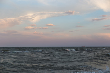 Fototapeta premium Sea landscape with waves on the water in pastel colors