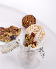 pistachios brittle croquands bars in a glass jar