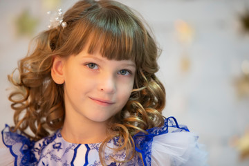 Portrait of a beautiful girl. Seven-year-old child. Primary school girl model