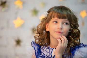 Portrait of a beautiful girl. Seven-year-old child. Primary school girl model