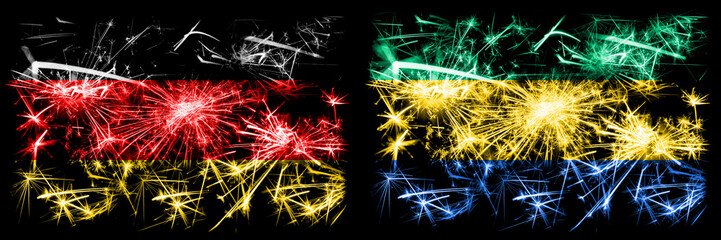 Germany, German vs Gabon, Gabonese New Year celebration travel sparkling fireworks flags concept background. Combination of two abstract states flags.
