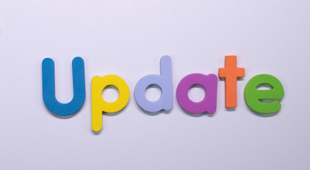 Word Update written with color sponge