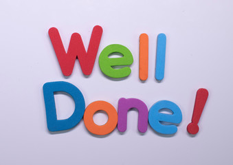  "Well done!" written with color sponge