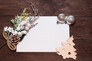 Christmas holiday composition on a dark wooden background. With space for your text.