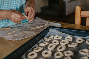 woman hands preparing traditional cakes and sweets