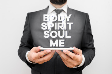 Text sign showing Body Spirit Soul Me. Business photo text Personal Balance Therapy Conciousness state of mind Male human wear formal work suit hold smart hi tech smartphone use hands
