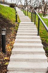 Modern concrete stairs and metal railings outside