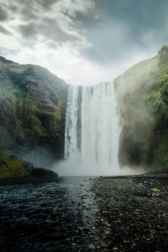 View of Skogafoss from bottom of the falls in the summer © Jarrod