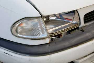 The car is broken and the headlamp is damaged