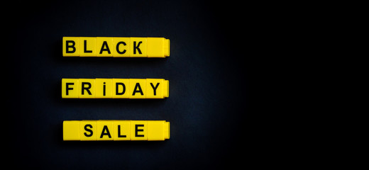 Black friday sale word on the black background with free place for your text.