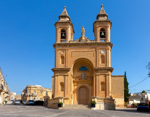 Marsaxlokk. The building of the church of St. Peter on a sunny morning.