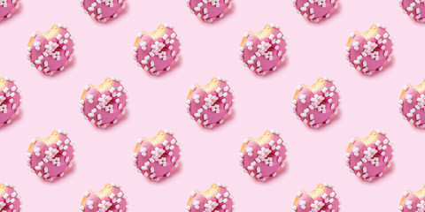 Seamless texture of Bitten pink icing donut with marshmallows on pink background, isometric view