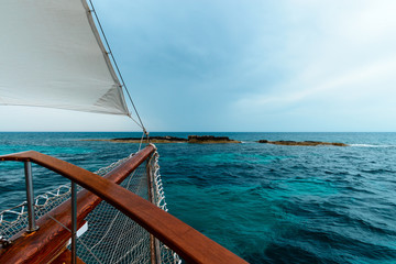 The stern of a yacht sailing in Mediterranean Sea
