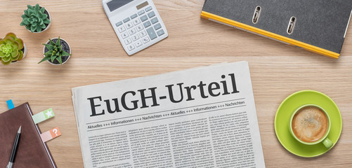 Zeitung mit der Headline EuGH-Urteil