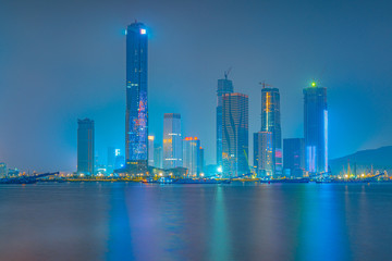 Plakat Night view of the financial base and center building in Zhuhai, Guangdong Province, China