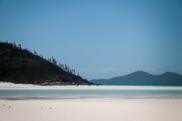 Fototapeta na wymiar Zoomed in view of Esk island from Whitehaven Beach, Whitsundays, Queensland, Australia