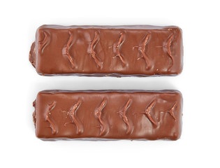 Two chocolate bars, isolated on a white background with shadows. Top view.