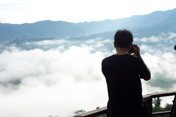 The photographer records the fog With camera Dslr