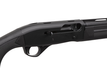 Modern black shotgun isolate on white background. Black semi-automatic shotgun on a light...
