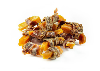 Dog treats, sweet potato and dried meat twists on white background. Natural ingredients no additives and grain free treats for pets.