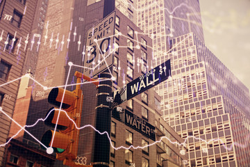 Forex chart on cityscape with tall buildings background multi exposure. Financial research concept.