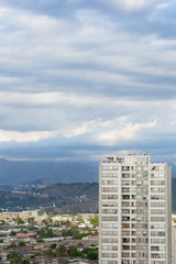 Fototapeta premium building on the right and city and hill