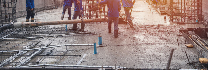 Construction site workers floor laying concrete mixer © sutlafk