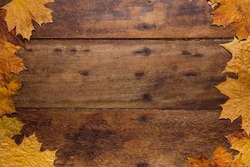 Autumn leaves on rustic wooden table. Thanksgiving background. Top view with copy space. - 302505965
