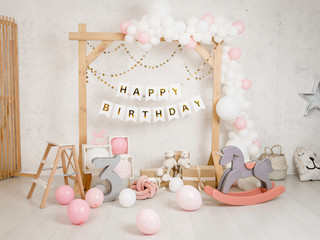 Birthday decorations with wooden arch, gifts, toys, balloons, garland and figure 3 for little baby...